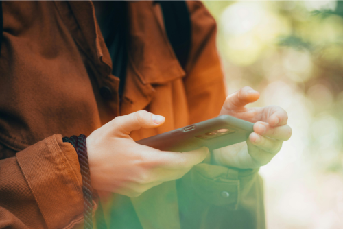 Hands Close Up of Person Holding Phone