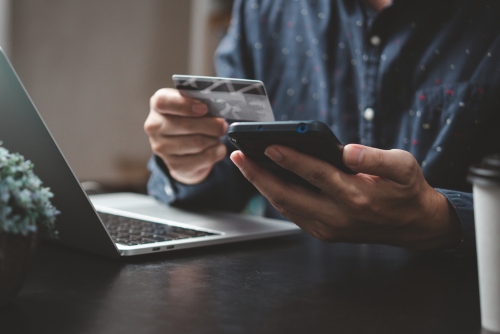 Person PayinOnline With Card On Phone